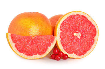 Fototapeta na wymiar Cut grapefruits and berry