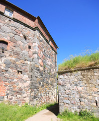 Fototapeta na wymiar Stone Wall of Suomenlinna Sveaborg Fortress in Helsinki, Finland