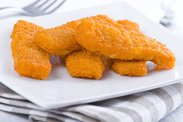 Fried fish sticks. Bastoncini di pesce.