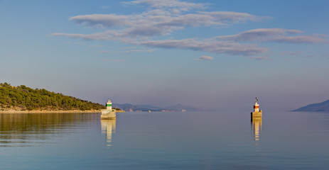 Harbor entrance lights at sunset, Epidaurus, Greece