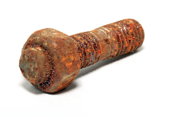 aging rusty nut on white background