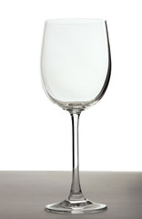 Single empty wine glass isolated on the white background