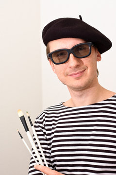 The Artist With Beret And Brushes