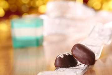 An assortment of fine chocolates  and milk chocolate.