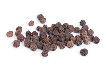 Pile Black pepper (Piper nigrum) isolated on white background.