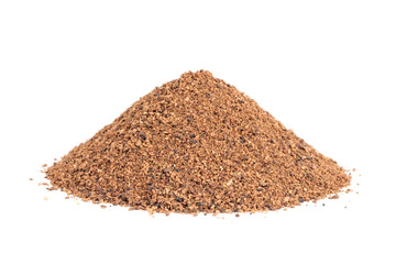 Pile of Nutmeg powder (Myristica fragrans) isolated on white