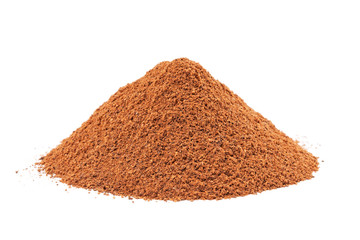 Heap of ground Cinnamon isolated on white background.