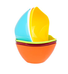 Stack of empty plastic bowls Isolated on white