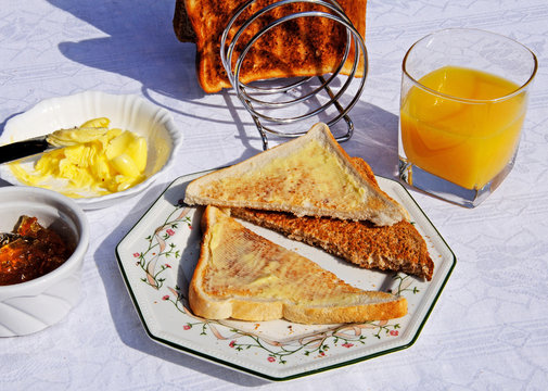 Toast and orange juice © Arena Photo UK