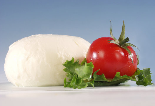 Mozzarella width tomato and salad