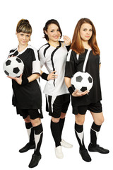 Three girls with balls