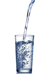 water pouring into glass isolated on white