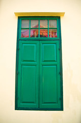 Green Wooden door to the building