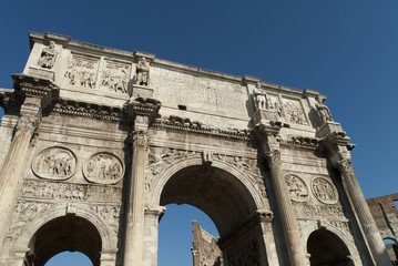 Fototapeta na wymiar Arch of Constantine by Colosseum in Rome Italy