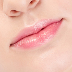 Close-up face of beauty young woman. Lips zone