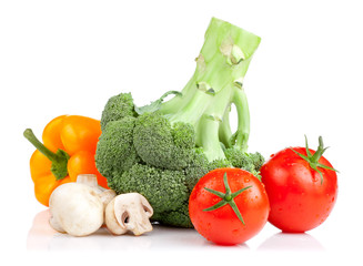 Set of vegetables: Broccoli, tomatoes, mushrooms and yellow pepp