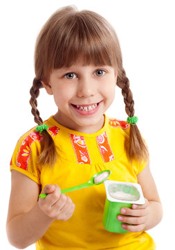 Child Eating Yogurt .