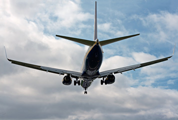 Passenger jet landing at airport