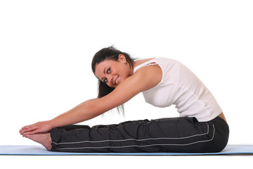 Fototapeta premium Young woman training yoga