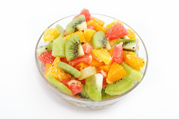 Fresh fruits salad on white background