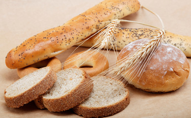 Fresh bread on a light brown background.