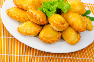Plate full of tasty meat patties