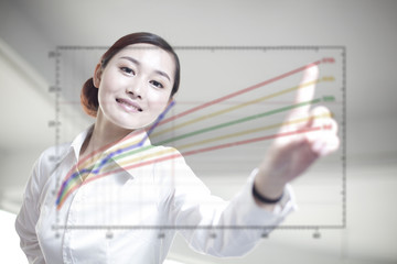 businesswoman touch chart on screen 