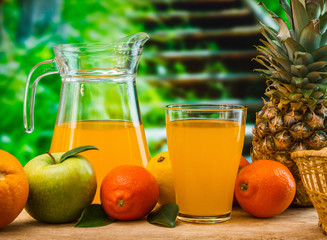 orange juice in a glass on a table
