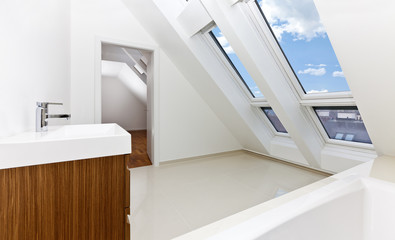 Sunlit modern bathroom of Contemporary apartment.