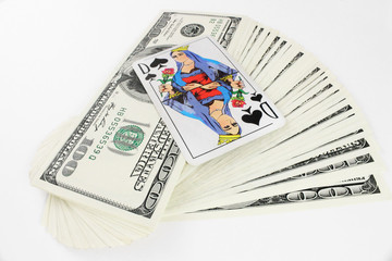 prize money dollars and playing cards on white background