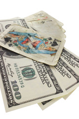 prize money dollars and old playing cards on white background