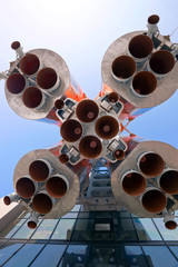 Details of space rocket engine over blue sky background