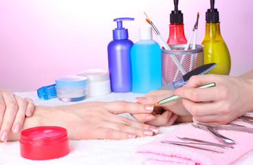 Manicure process in beautiful salon