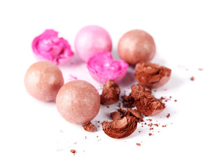 pink and brown powder balls isolated on white