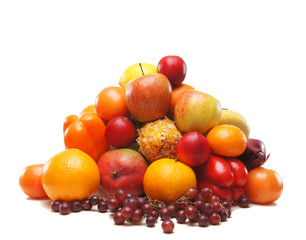 A pile of fresh and tasty fruits isolated on a white background