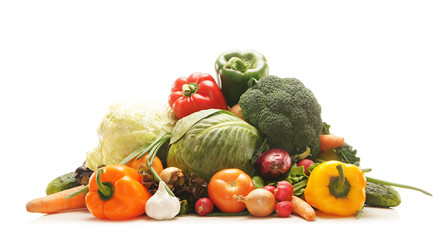 Pile of fresh and tasty vegetables isolated on white