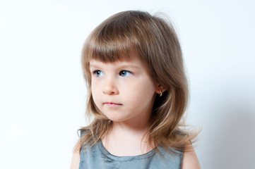 Naklejka premium Portrait of a cute little girl
