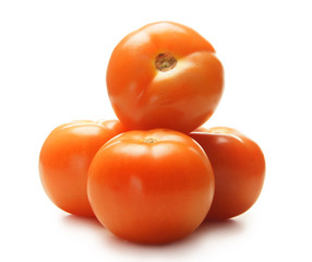 Fresh red tomatoes isolated on a white background