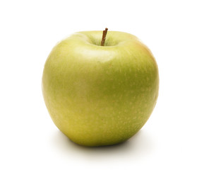A fresh green apple isolated on a white background
