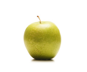 A fresh green apple isolated on a white background