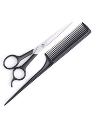 Hair cutting shears and comb isolated on white