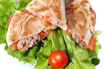 tortilla with tuna and tomatoes, typical italian flatbread