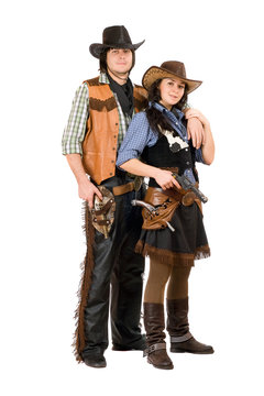 Young cowboy and cowgirl