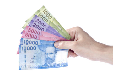 Man Holding Chilean Pesos Isolated on White