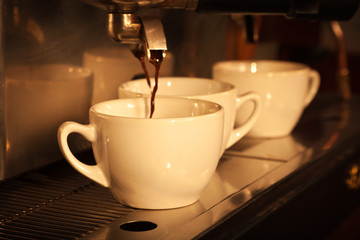 Espresso being drawn out of a prof espresso machine. Vintage