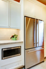 Stainless steal refridgirator with microwave.