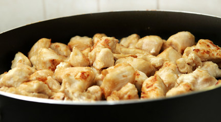 browned chicken pieces