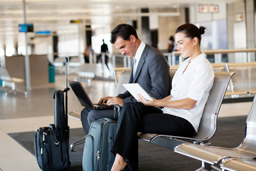 business travellers waiting for their flight at airport - 39916870