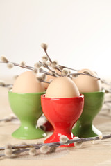 Eggs in red and green eggcups