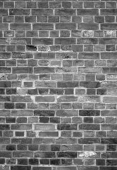 Old English brick wall black and white background.